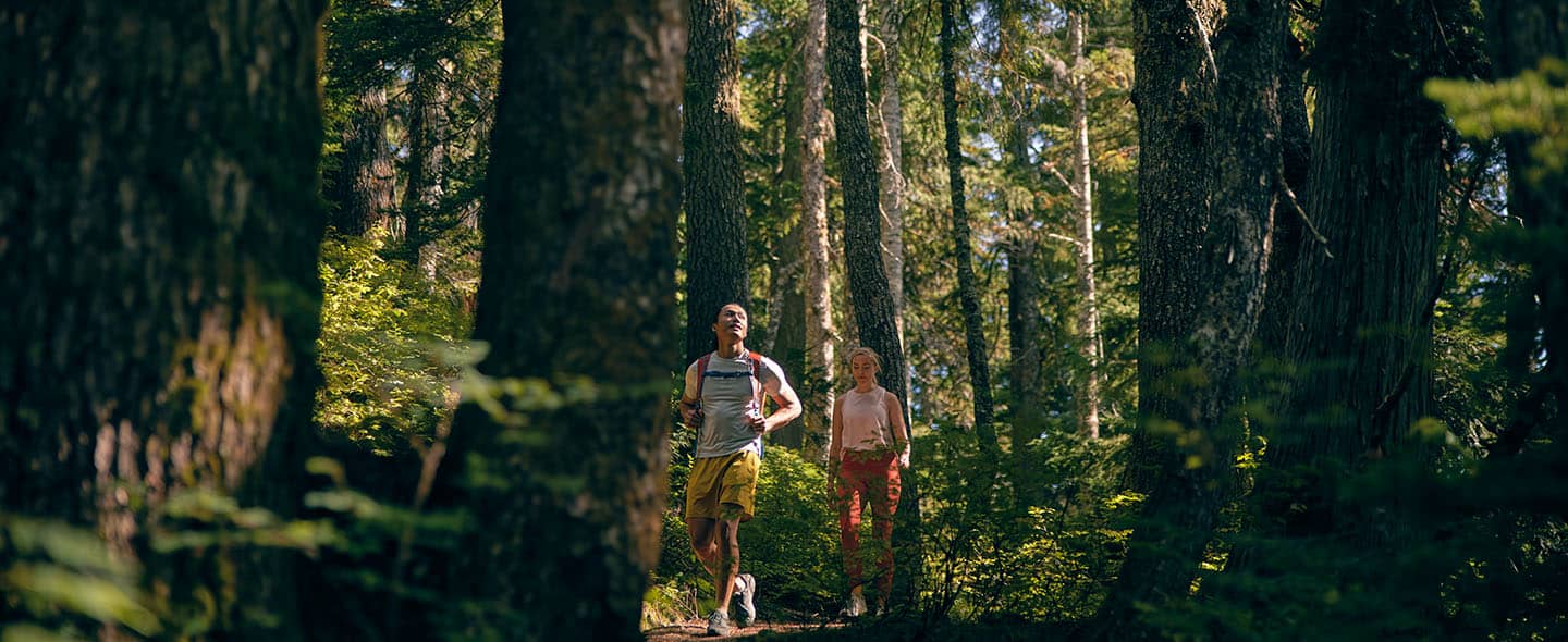 couple hiking in the woods