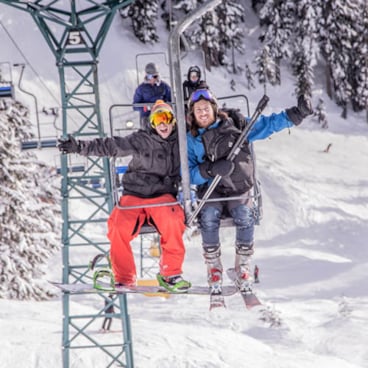 Couple on chair lift